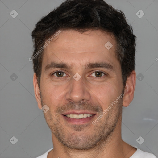 Joyful white adult male with short  brown hair and brown eyes