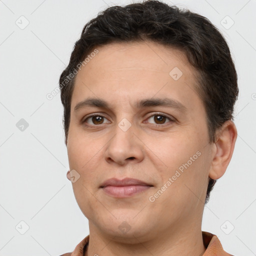 Joyful white young-adult male with short  brown hair and brown eyes