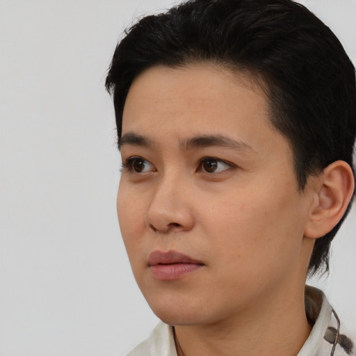 Neutral white young-adult male with short  black hair and brown eyes
