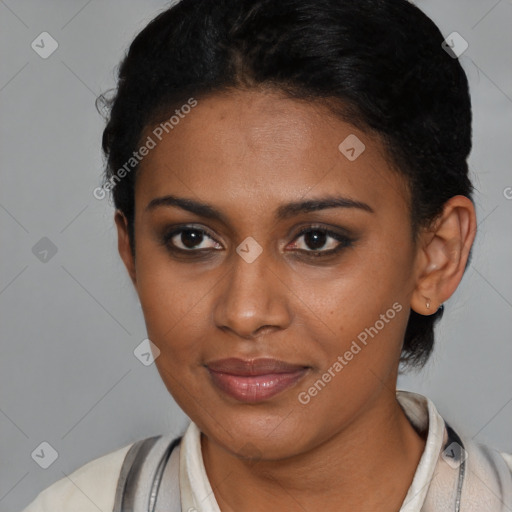 Joyful latino young-adult female with short  brown hair and brown eyes