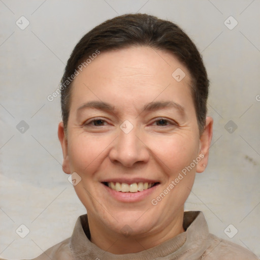 Joyful white adult female with short  brown hair and brown eyes