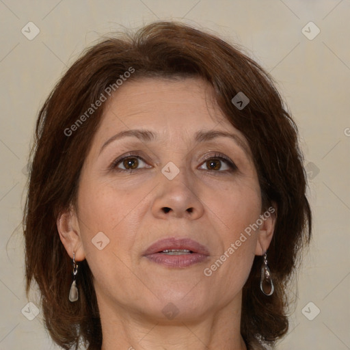 Joyful white adult female with medium  brown hair and brown eyes