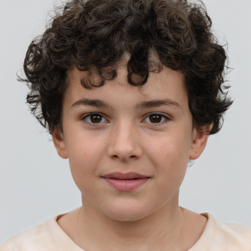 Joyful white child male with short  brown hair and brown eyes