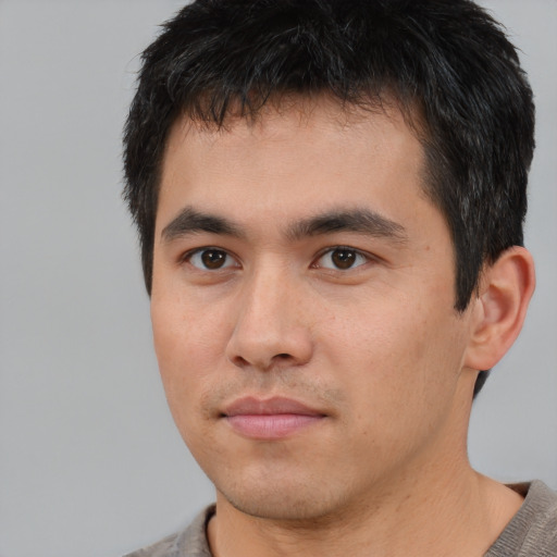 Neutral asian young-adult male with short  black hair and brown eyes