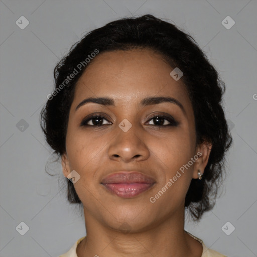 Joyful black young-adult female with medium  black hair and brown eyes