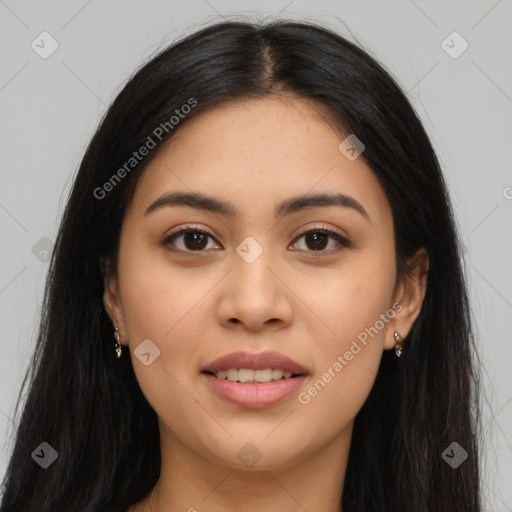 Joyful latino young-adult female with long  black hair and brown eyes