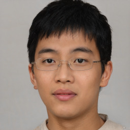 Neutral asian young-adult male with short  brown hair and brown eyes