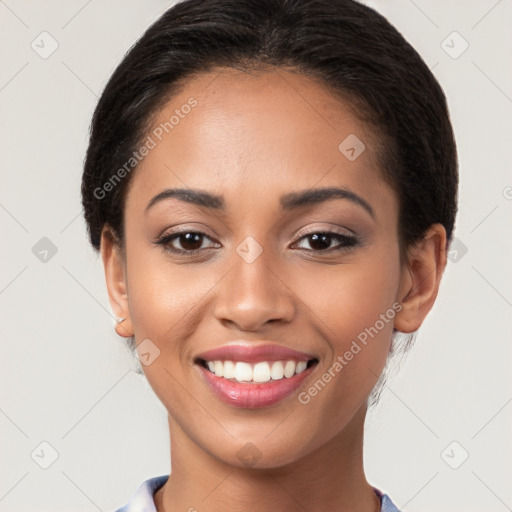 Joyful latino young-adult female with short  brown hair and brown eyes