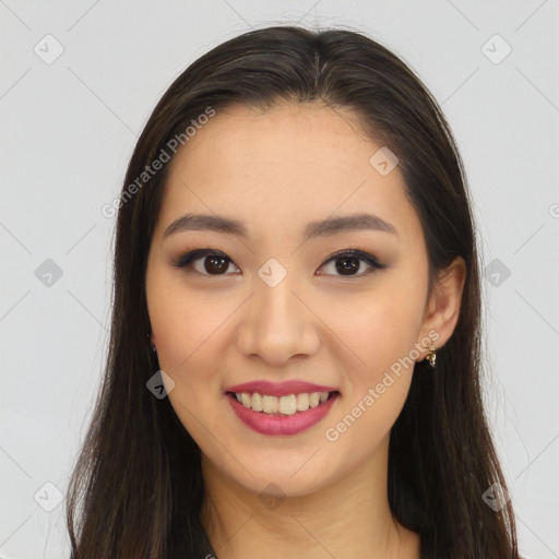 Joyful asian young-adult female with long  brown hair and brown eyes