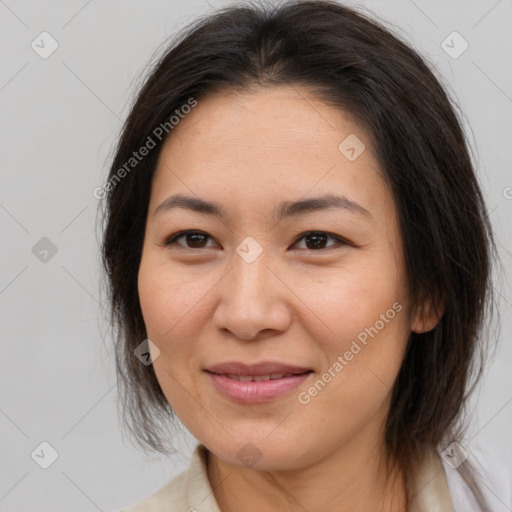 Joyful white adult female with medium  brown hair and brown eyes