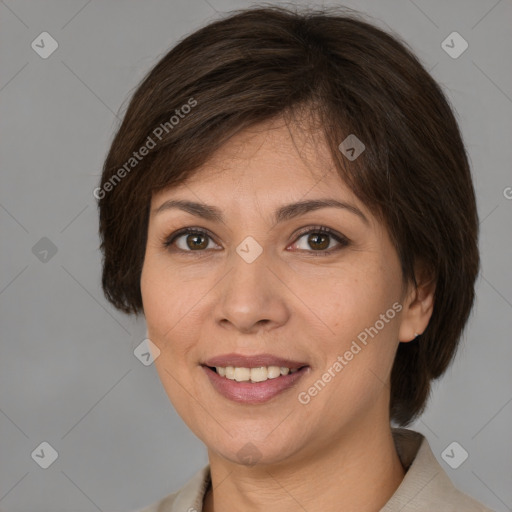 Joyful white adult female with medium  brown hair and brown eyes