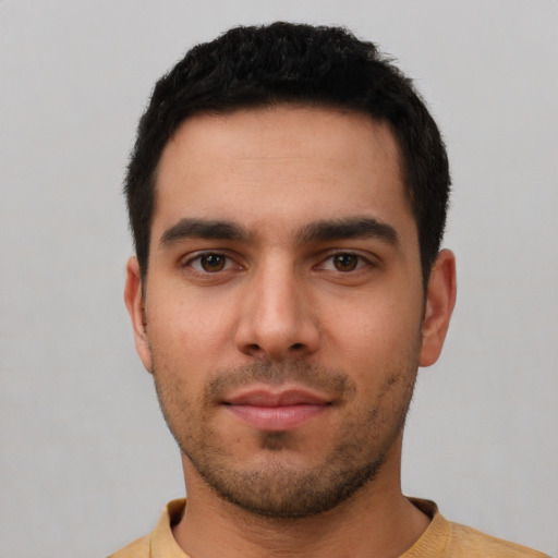 Neutral white young-adult male with short  black hair and brown eyes