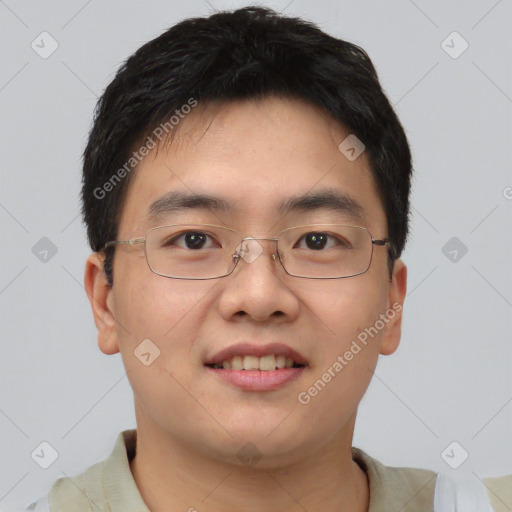 Joyful asian young-adult male with short  brown hair and brown eyes