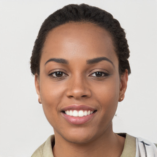 Joyful latino young-adult female with short  brown hair and brown eyes