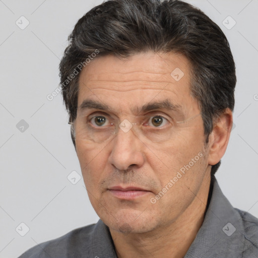 Neutral white middle-aged male with short  brown hair and brown eyes