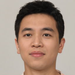 Neutral asian young-adult male with short  brown hair and brown eyes