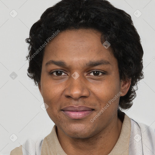 Joyful black young-adult male with short  brown hair and brown eyes