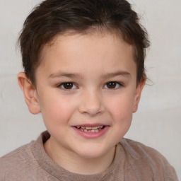 Joyful white child female with short  brown hair and brown eyes