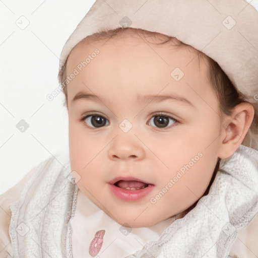 Joyful white child female with short  brown hair and brown eyes