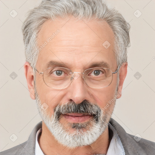 Neutral white middle-aged male with short  gray hair and brown eyes