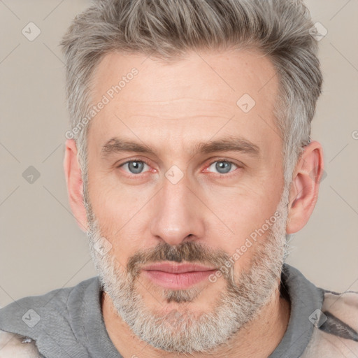 Neutral white adult male with short  brown hair and brown eyes