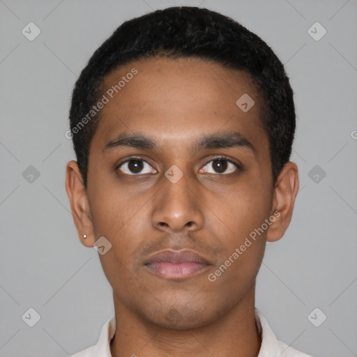 Neutral latino young-adult male with short  black hair and brown eyes