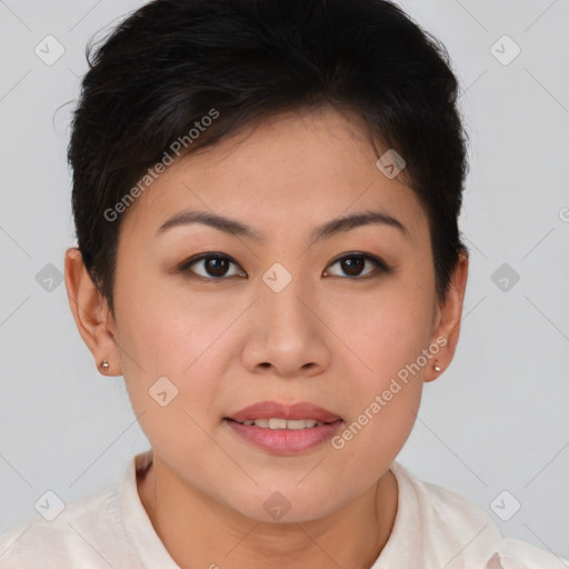 Joyful asian young-adult female with short  brown hair and brown eyes