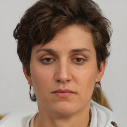 Neutral white young-adult female with short  brown hair and brown eyes