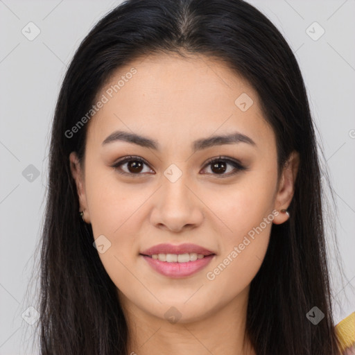 Joyful asian young-adult female with long  brown hair and brown eyes