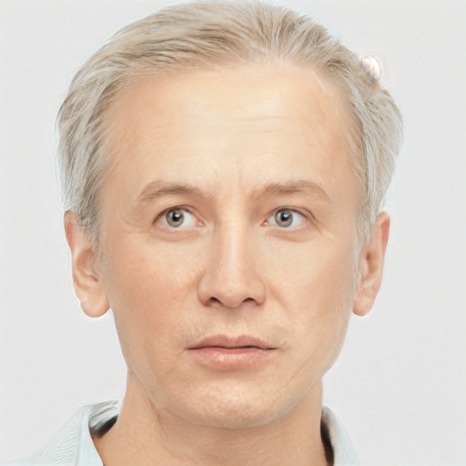 Neutral white adult male with short  blond hair and grey eyes