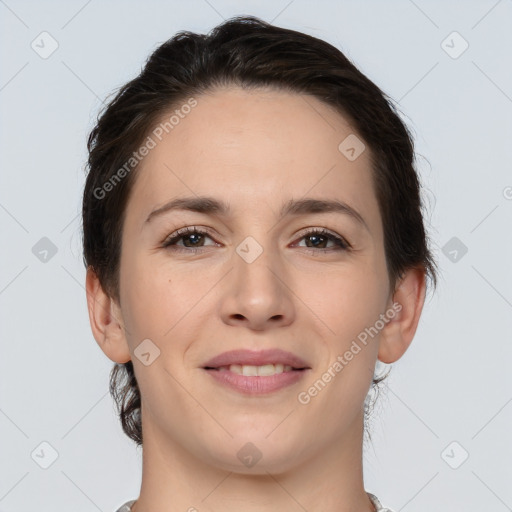 Joyful white young-adult female with medium  brown hair and brown eyes