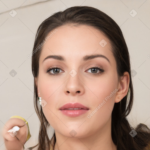 Neutral white young-adult female with long  brown hair and brown eyes