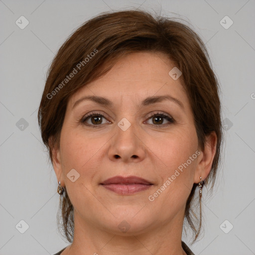 Joyful white adult female with medium  brown hair and grey eyes