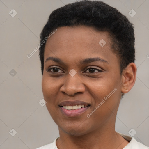 Joyful black young-adult female with short  black hair and brown eyes