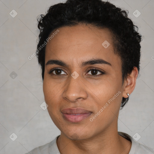 Joyful latino young-adult female with short  black hair and brown eyes