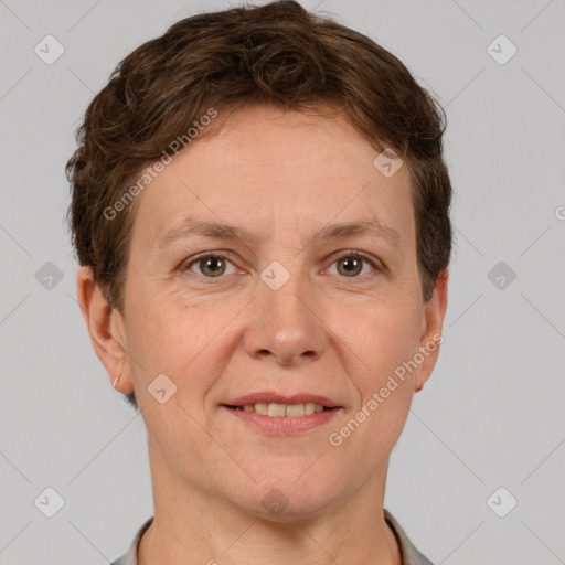 Joyful white adult female with short  brown hair and brown eyes