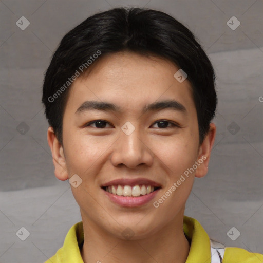 Joyful asian young-adult male with short  brown hair and brown eyes