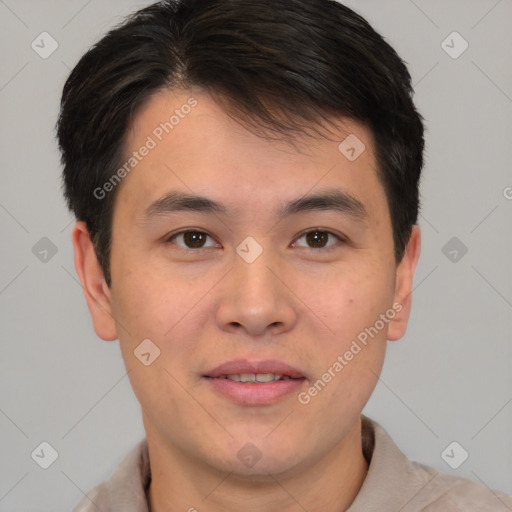 Joyful asian young-adult male with short  brown hair and brown eyes