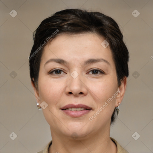 Joyful white adult female with short  brown hair and brown eyes