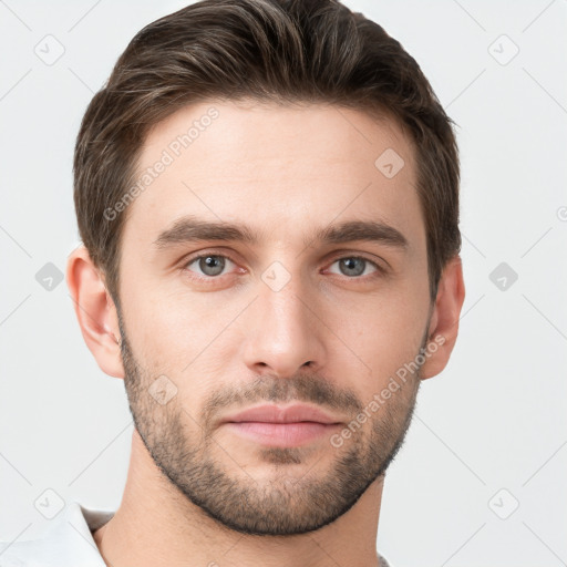 Neutral white young-adult male with short  brown hair and brown eyes