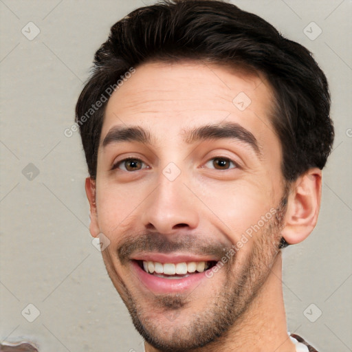 Joyful white young-adult male with short  black hair and brown eyes