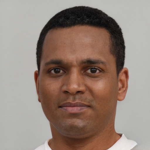 Neutral black young-adult male with short  black hair and brown eyes