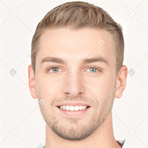 Joyful white young-adult male with short  brown hair and grey eyes