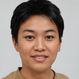 Joyful asian young-adult female with short  brown hair and brown eyes