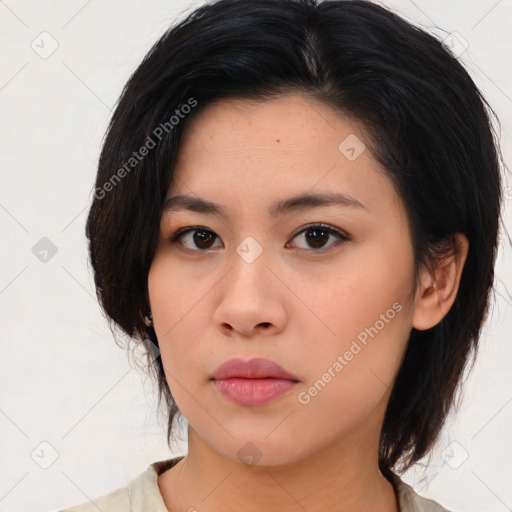 Neutral asian young-adult female with medium  brown hair and brown eyes
