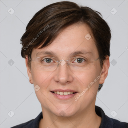 Joyful white adult female with short  brown hair and grey eyes