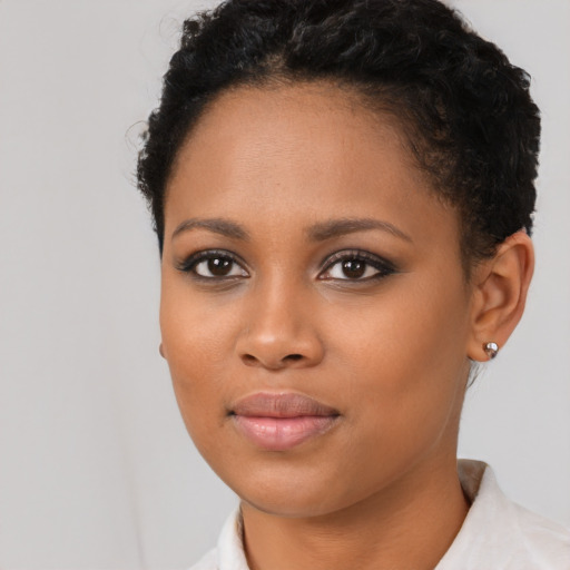 Neutral black young-adult female with short  black hair and brown eyes