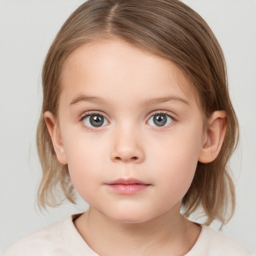 Neutral white child female with medium  brown hair and grey eyes