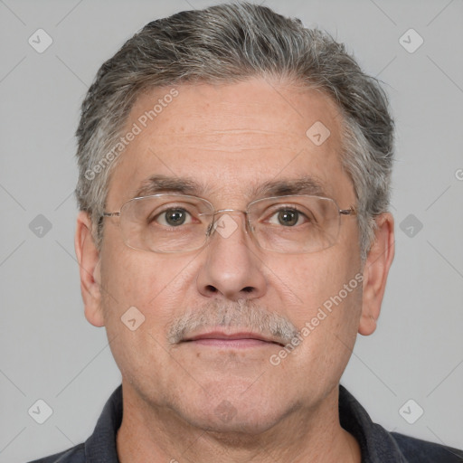 Neutral white middle-aged male with short  gray hair and brown eyes