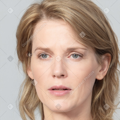 Neutral white adult female with medium  brown hair and blue eyes